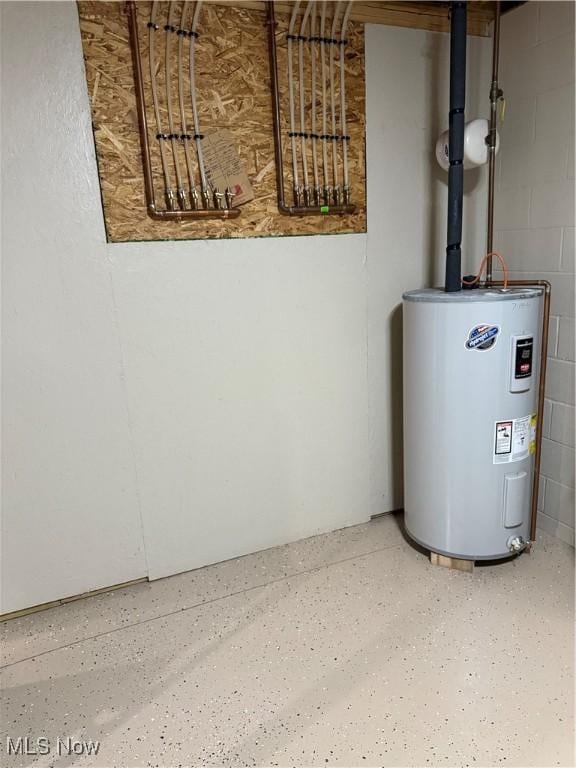 102 Maple, Bethesda, OH 43719 - utility room with electric water heater