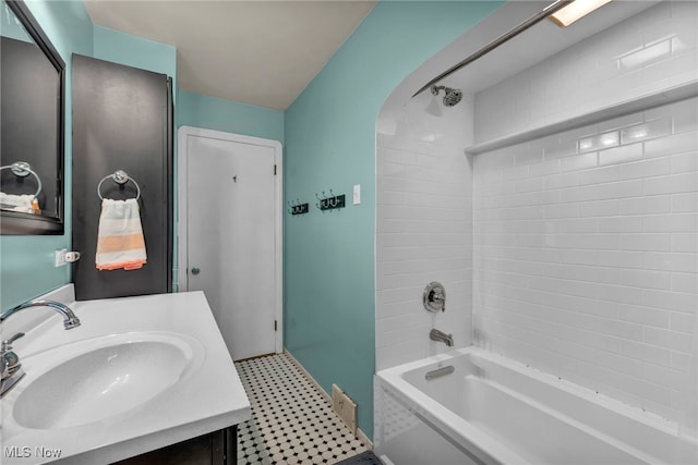 3475 Clague Rd, North Olmsted, OH 44070 - full bath with tile patterned floors, bathing tub / shower combination, and vanity
