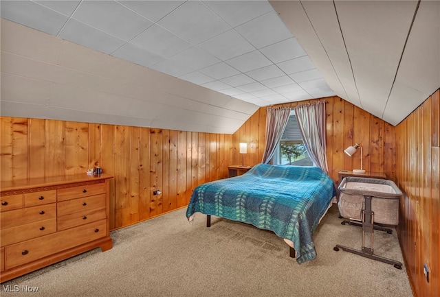 3475 Clague Rd, North Olmsted, OH 44070 - bedroom with wooden walls, carpet, and lofted ceiling