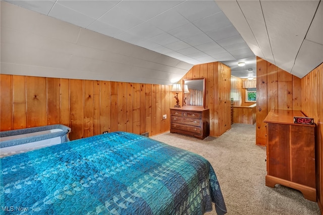 3475 Clague Rd, North Olmsted, OH 44070 - bedroom featuring carpet flooring, wooden walls, and lofted ceiling