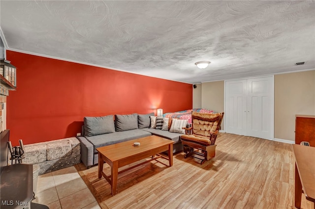 3475 Clague Rd, North Olmsted, OH 44070 - living room with light wood-type flooring and a fireplace