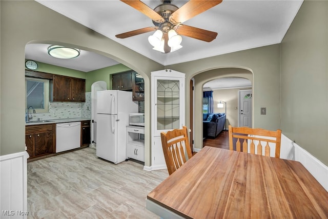 3475 Clague Rd, North Olmsted, OH 44070 - dining space with ceiling fan and arched walkways