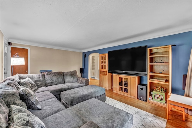3475 Clague Rd, North Olmsted, OH 44070 - living area with wood finished floors and ornamental molding