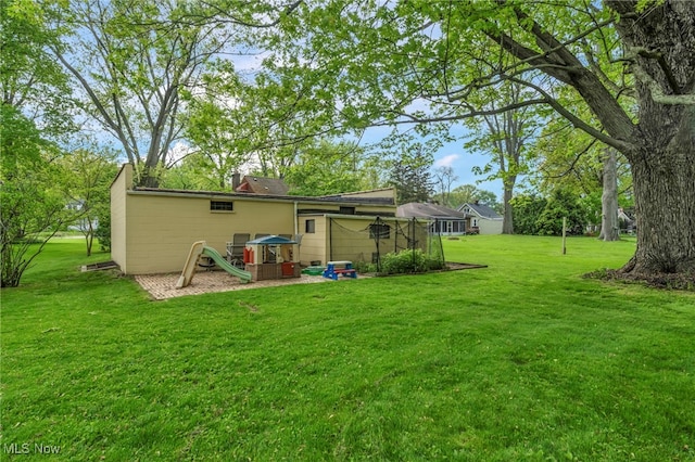 3475 Clague Rd, North Olmsted, OH 44070 - back of house with a yard