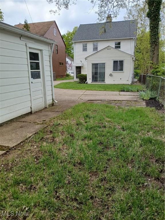 3609 Stoer Rd, Shaker Heights, OH 44122 - rear view of property with a chimney