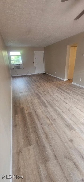 681 Longcoy Ave, Kent, OH 44240 - unfurnished room with light wood-style floors, a textured ceiling, a ceiling fan, and baseboards