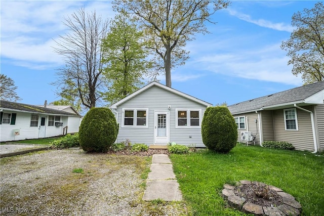 5755 Lake Rd W Unit 6, Ashtabula, OH 44004 - view of front of house featuring an outdoor fire pit and a front yard