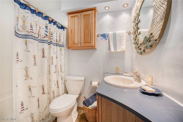 5755 Lake Rd W Unit 6, Ashtabula, OH 44004 - full bathroom with toilet, vanity, baseboards, and a shower with shower curtain