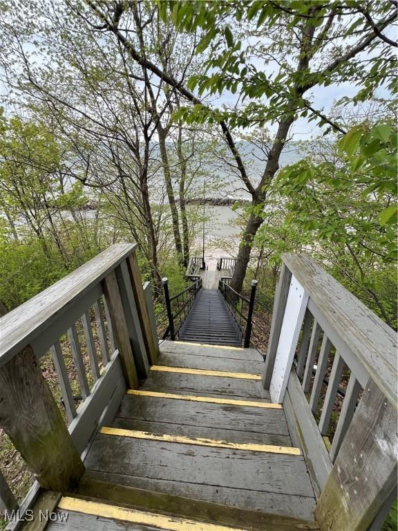 5755 Lake Rd W Unit 6, Ashtabula, OH 44004 - staircase with a water view