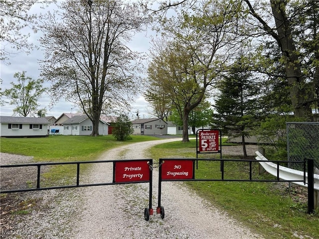 5755 Lake Rd W Unit 6, Ashtabula, OH 44004 - exterior view of fence and driveway
