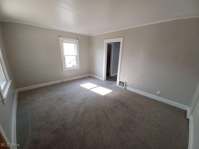 438 Elberen St, Youngstown, OH 44509 - carpeted empty room with baseboards and crown molding