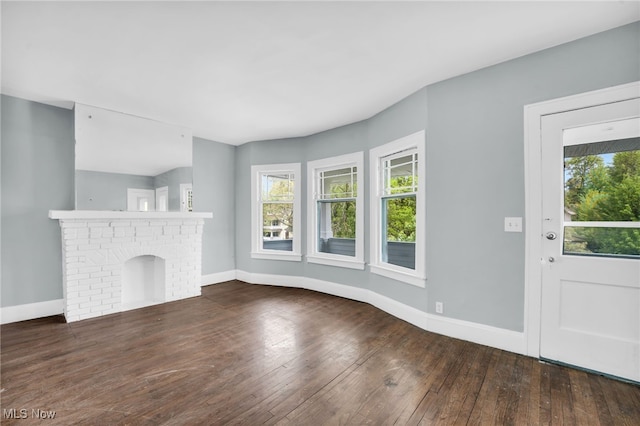 3436 Beechwood Ave, Cleveland Heights, OH 44118 - unfurnished living room with baseboards and hardwood / wood-style floors