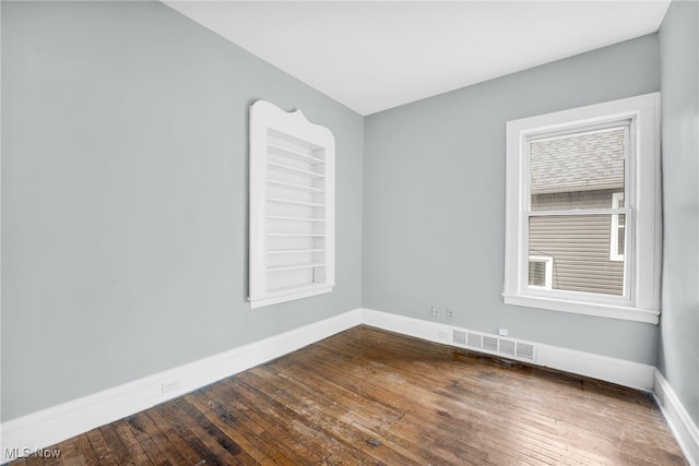 3436 Beechwood Ave, Cleveland Heights, OH 44118 - empty room featuring baseboards and dark wood-style floors