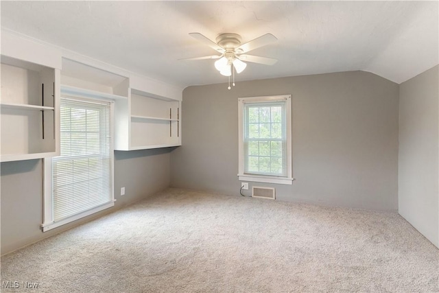 315 W Main St, Canfield, OH 44406 - empty room with ceiling fan, carpet flooring, and lofted ceiling