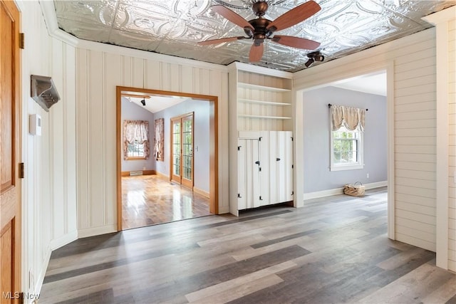 315 W Main St, Canfield, OH 44406 - empty room featuring an ornate ceiling, wood finished floors, ceiling fan, and baseboards