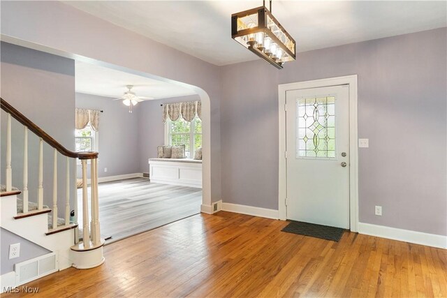 315 W Main St, Canfield, OH 44406 - entrance foyer with wood finished floors, arched walkways, and stairs