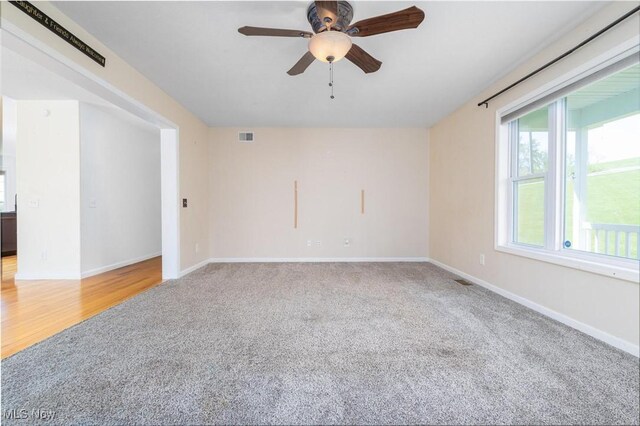 99 Township Road 262, Bloomingdale, OH 43910 - spare room featuring carpet, a ceiling fan, and baseboards