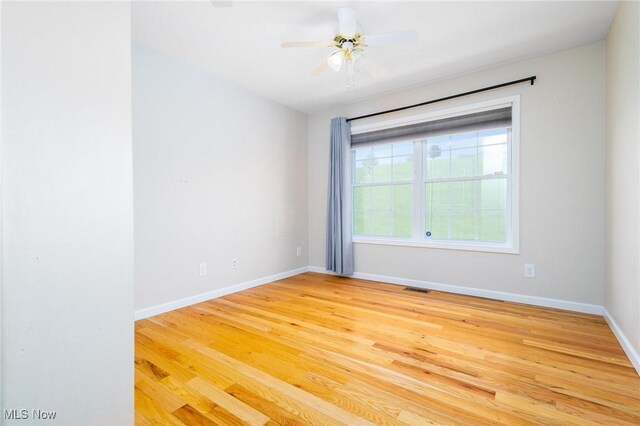 99 Township Road 262, Bloomingdale, OH 43910 - unfurnished room with light wood-style flooring, baseboards, and a ceiling fan