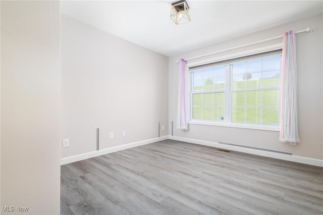 99 Township Road 262, Bloomingdale, OH 43910 - unfurnished room featuring wood finished floors and baseboards