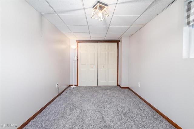 99 Township Road 262, Bloomingdale, OH 43910 - unfurnished bedroom with carpet floors, baseboards, a drop ceiling, and a closet