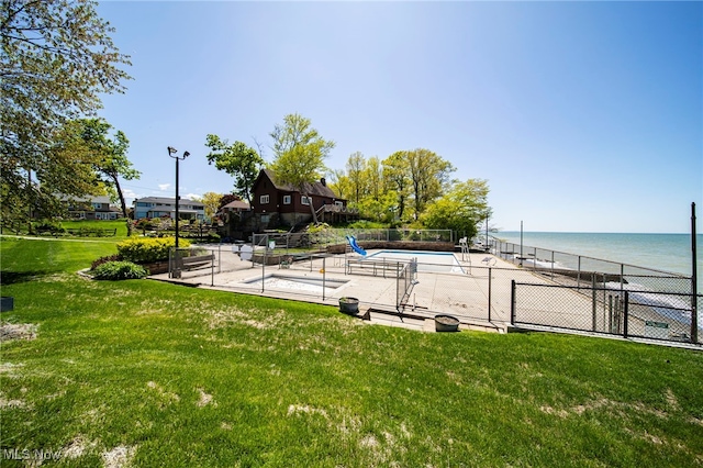 view of community with a water view, a swimming pool, and a patio