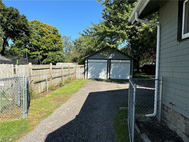 detached garage with fence