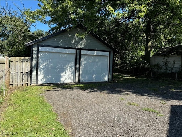 detached garage with fence
