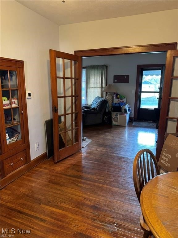 dining space featuring wood finished floors