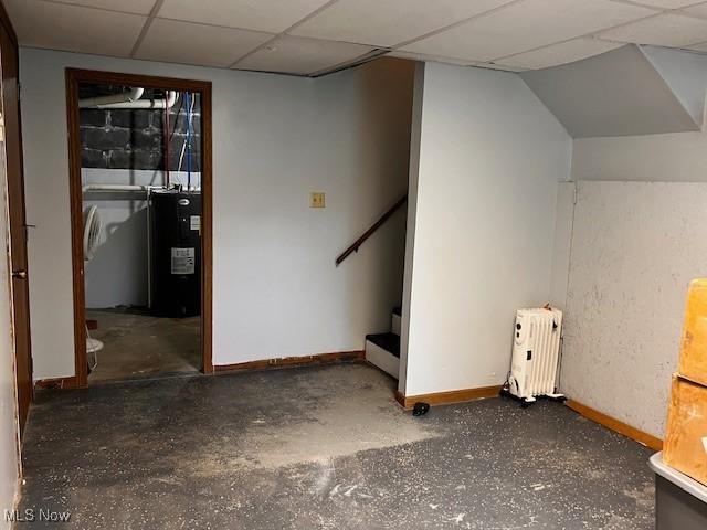 206 Anderson Ave, Bethesda, OH 43719 - finished basement featuring radiator, water heater, baseboards, and a drop ceiling