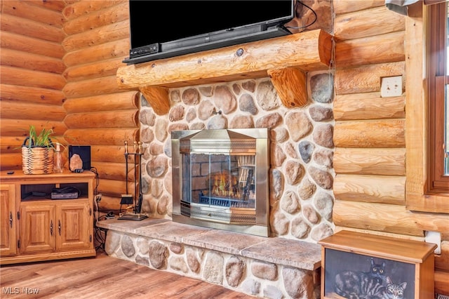 detailed view of wood finished floors and log walls