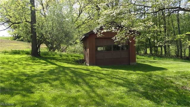 7517 Veterans Blvd, Chester, WV 26034 - view of grassy yard featuring an outdoor structure