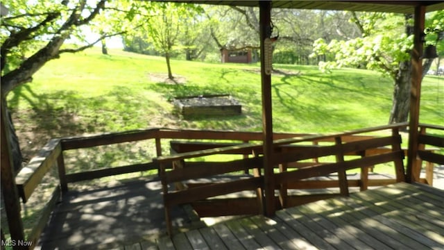7517 Veterans Blvd, Chester, WV 26034 - deck featuring a lawn
