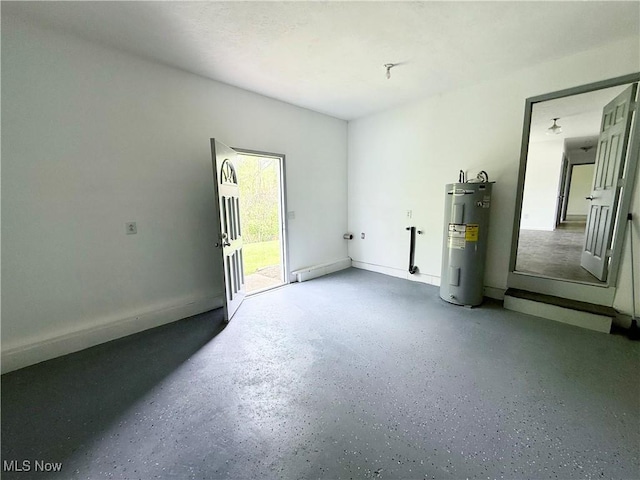 32 Ash Cir, Davisville, WV 26142 - spare room featuring water heater and speckled floor