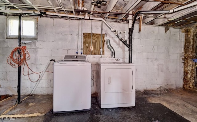 17 Spring St, Dennison, OH 44621 - clothes washing area featuring washing machine and dryer