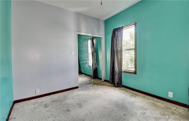 17 Spring St, Dennison, OH 44621 - carpeted empty room with baseboards