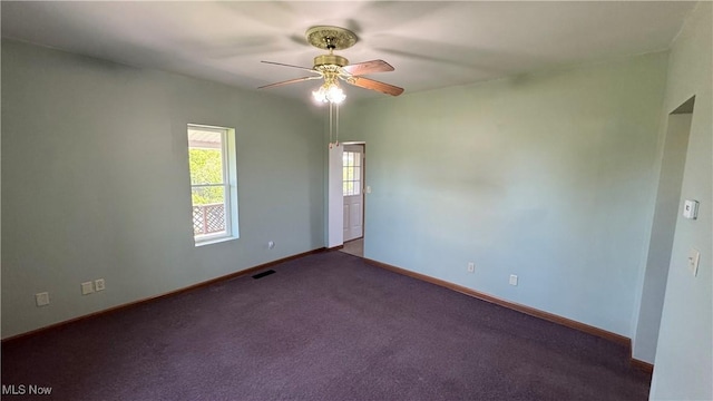 6255 Highland Ridge Rd, Lowell, OH 45744 - carpeted empty room with a ceiling fan and baseboards