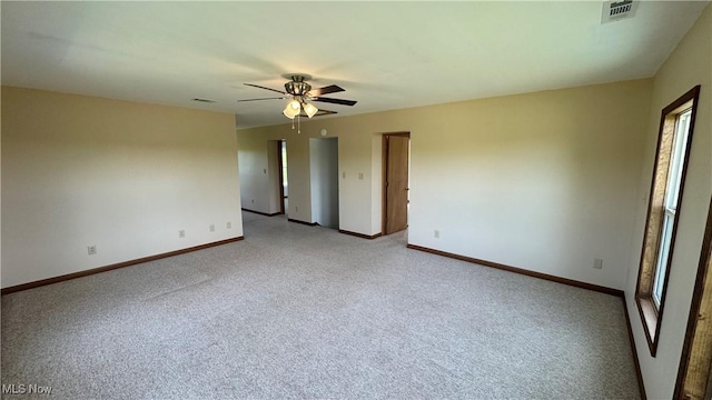6255 Highland Ridge Rd, Lowell, OH 45744 - empty room featuring ceiling fan, light colored carpet, and baseboards