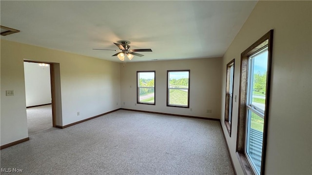 6255 Highland Ridge Rd, Lowell, OH 45744 - empty room with light carpet, baseboards, and ceiling fan