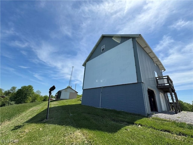 6255 Highland Ridge Rd, Lowell, OH 45744 - view of side of home with a lawn, a wooden deck, and stairway