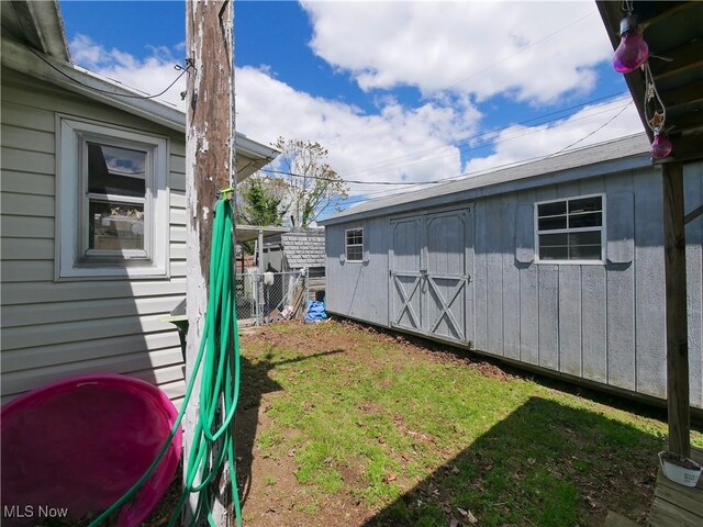 111 Pine Ln, Barnesville, OH 43713 - view of yard featuring a storage shed and an outdoor structure