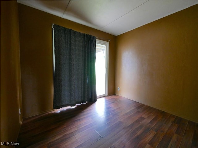 111 Pine Ln, Barnesville, OH 43713 - unfurnished room with dark wood-type flooring