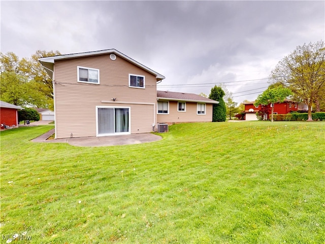 1930 Aldersgate Dr, Lyndhurst, OH 44124 - back of property featuring a patio area, a lawn, and central AC unit