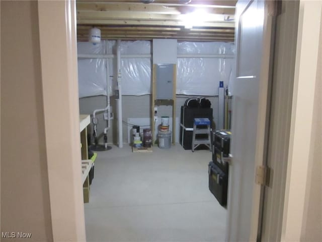 unfinished basement with electric panel