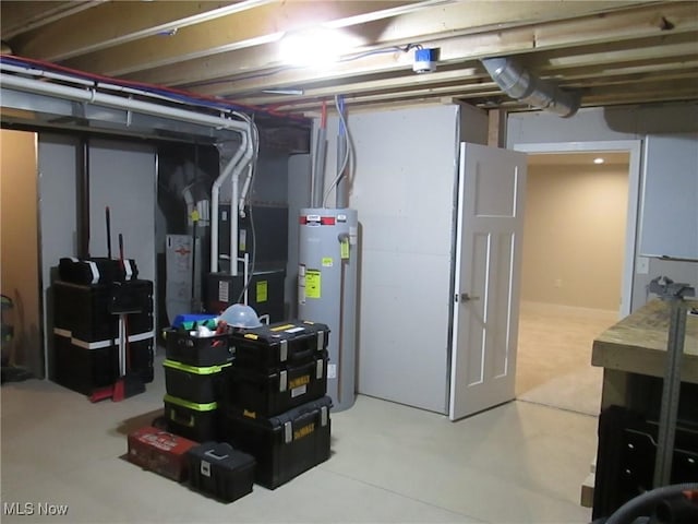 unfinished below grade area with gas water heater and heating unit