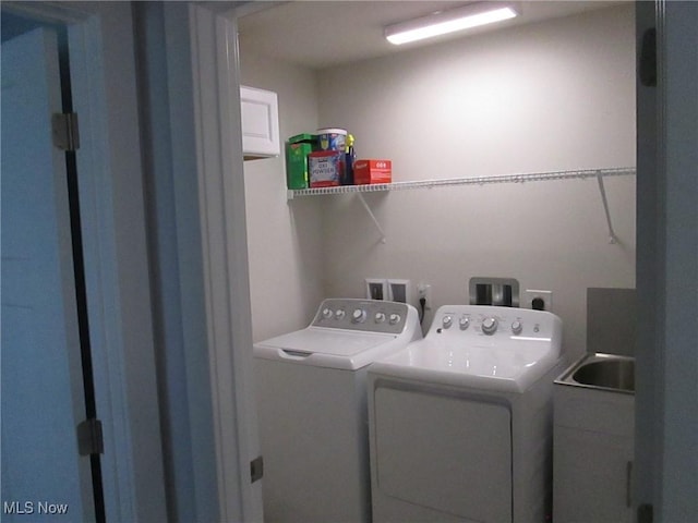 laundry area featuring separate washer and dryer