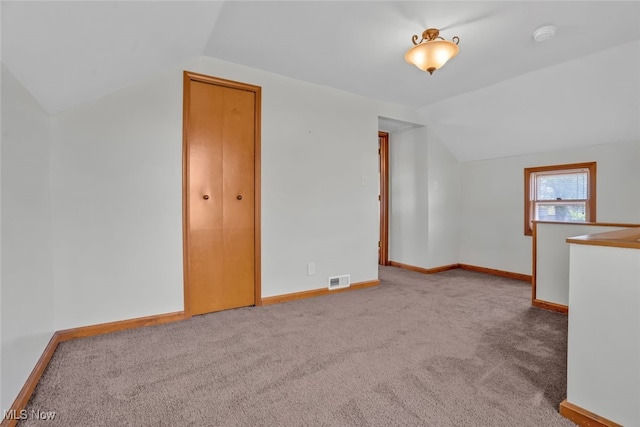 2000 Henry Ave SW, Canton, OH 44706 - bonus room featuring lofted ceiling, carpet flooring, and baseboards
