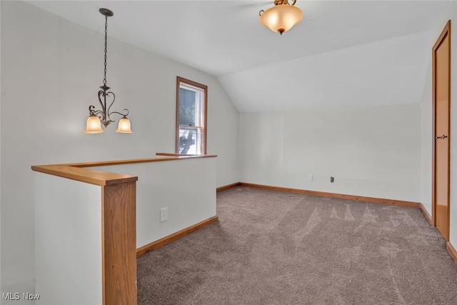2000 Henry Ave SW, Canton, OH 44706 - bonus room with lofted ceiling, carpet, baseboards, and a chandelier