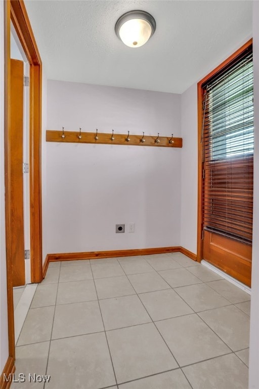 2000 Henry Ave SW, Canton, OH 44706 - spare room featuring baseboards and light tile patterned floors