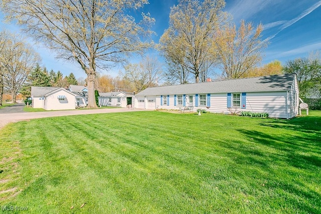 7101 Reynolds Rd, Mentor, OH 44060 - single story home with a front yard
