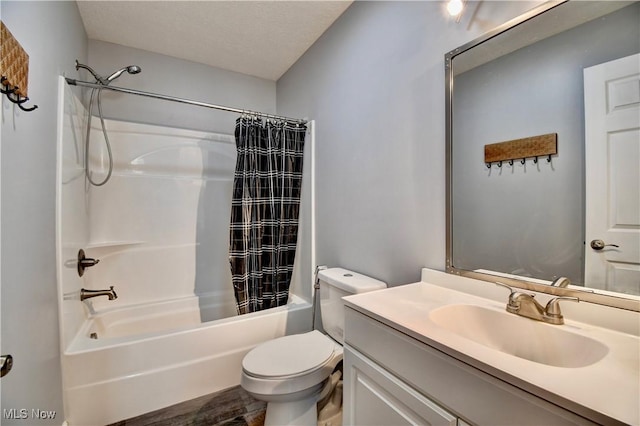 213 Knollton Dr, Millersburg, OH 44654 - bathroom featuring shower / bath combo, toilet, and vanity